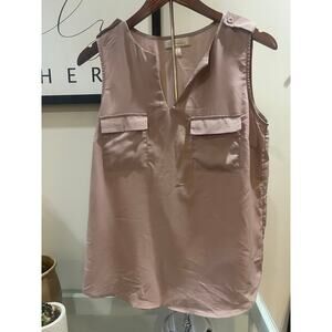 Sleeveless pink blouse
